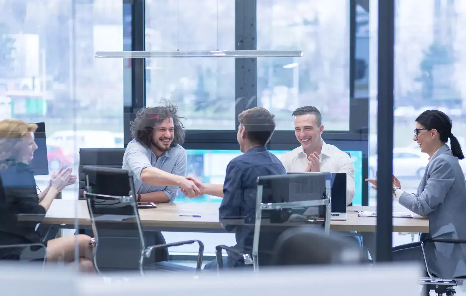 Modern ADSAYS office workspace with engaged employees